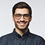 A man with glasses smile testimonial for Mundida Digital Marketing Agency